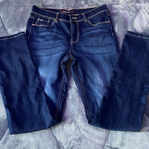 2 pairs of blue jeans, one is regular and the other is slim